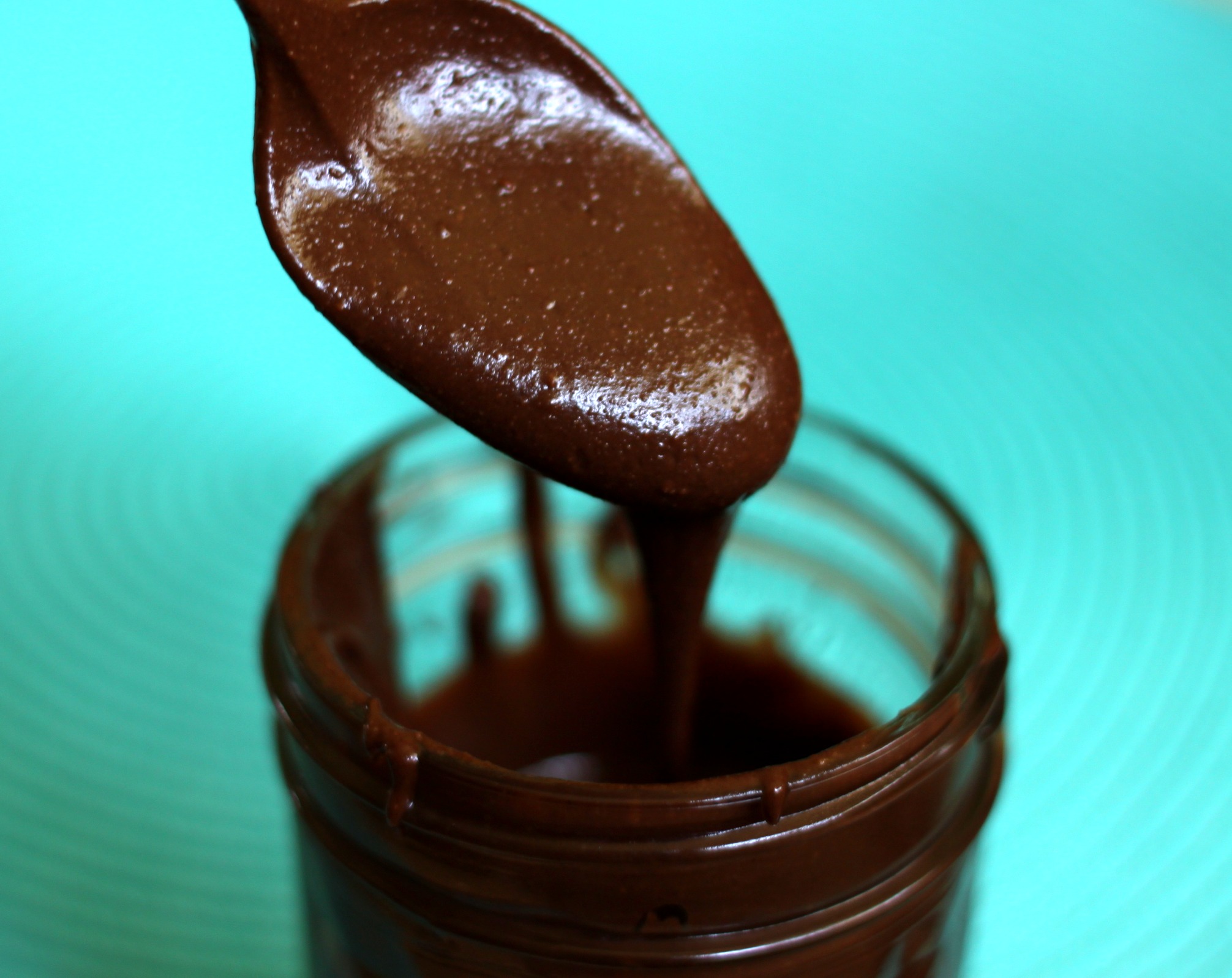 Chocolate peanut butter spread on spoon 1